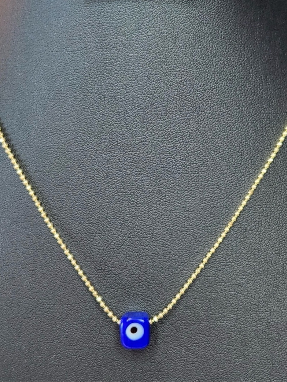 Murano glass Turkish evil eye pendant with 14k gold plated bead necklace.